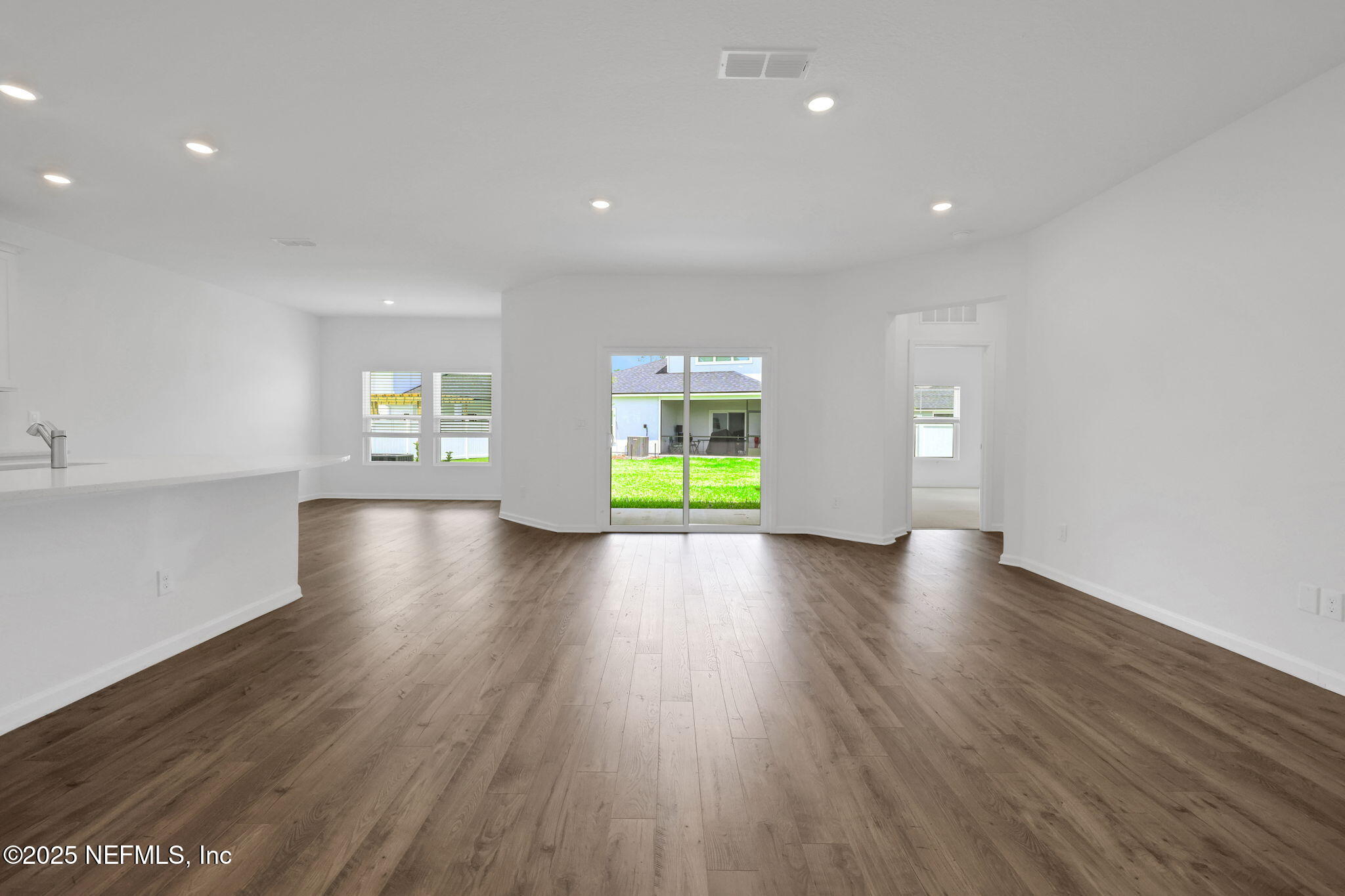 44 Martos Court St. Augustine, FL 32095 - Photo 18 of 40 a view of a room with wooden floor and window