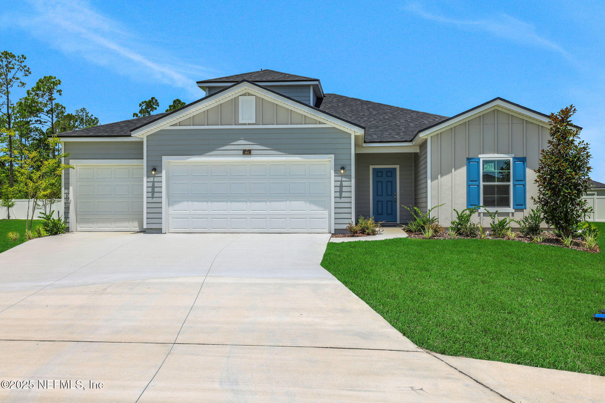44 Martos Court St. Augustine, FL 32095 - Photo 2 of 40 a front view of a house with a yard