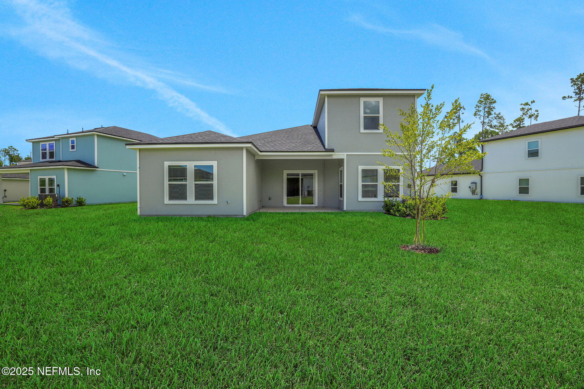 44 Martos Court St. Augustine, FL 32095 - Photo 5 of 40 a front view of house with yard and green space