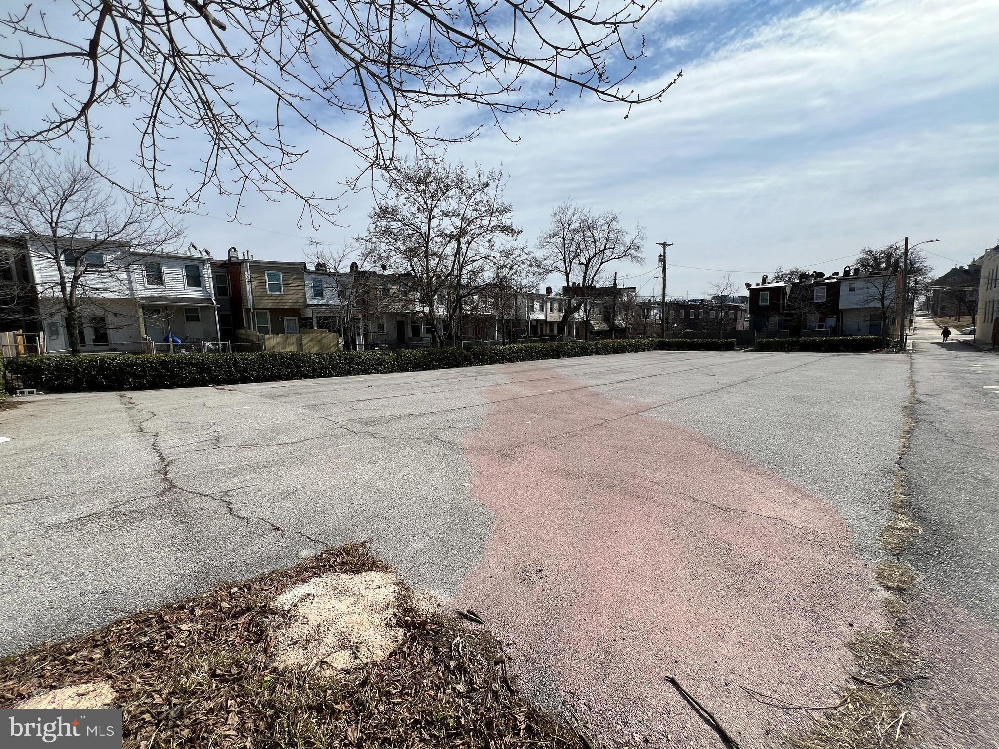 1601 North Dallas Street Baltimore, MD 21213 - Photo 2 of 3 a street view covered with snow