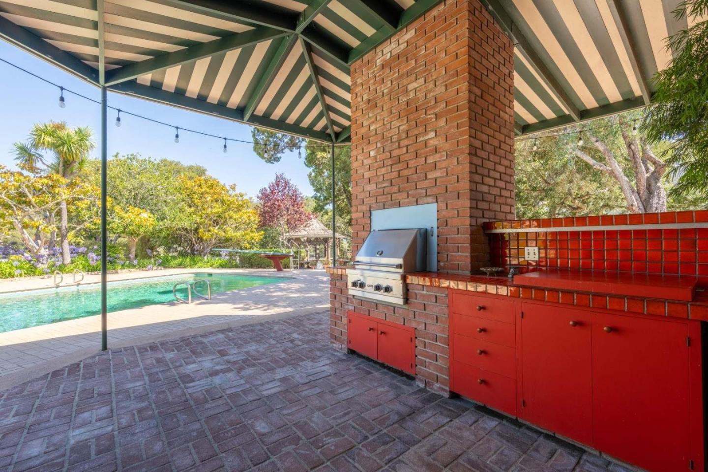 22 Rancho Fiesta Road Carmel Valley, CA 93924 - Photo 21 of 44 a view of a backyard with wooden fence