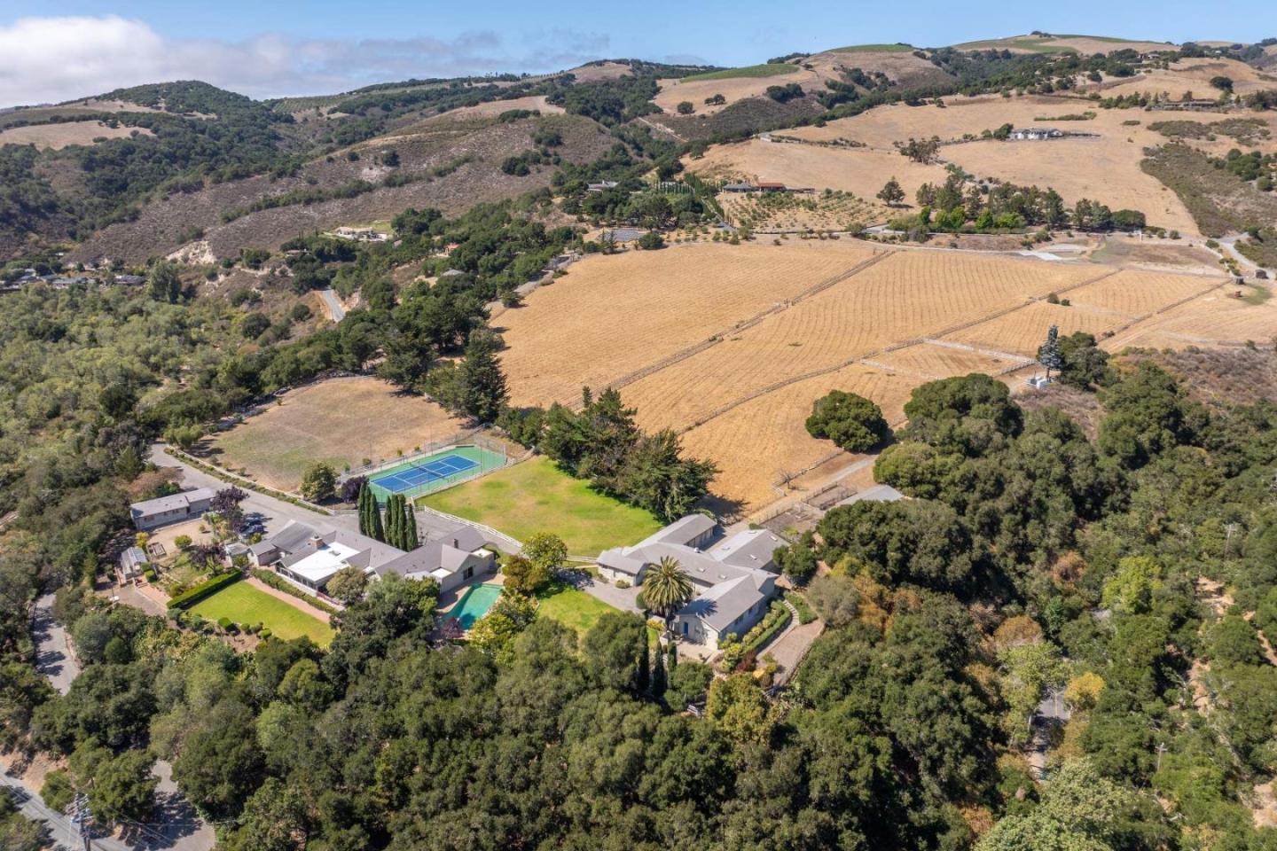 22 Rancho Fiesta Road Carmel Valley, CA 93924 - Photo 27 of 44 an aerial view of residential houses with outdoor space