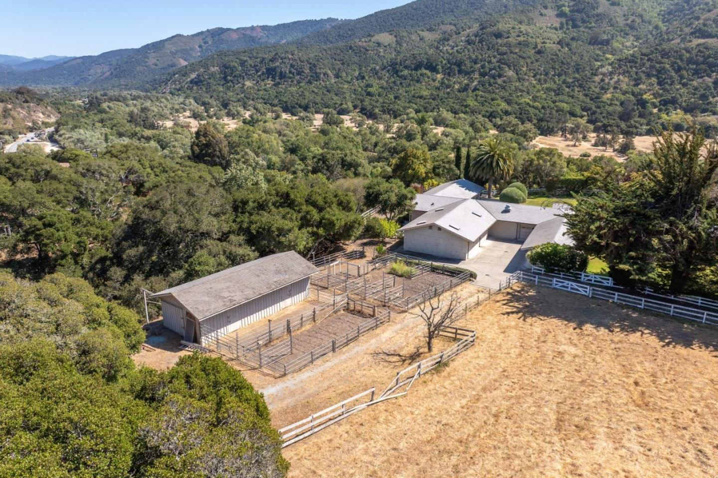 22 Rancho Fiesta Road Carmel Valley, CA 93924 - Photo 28 of 44 an aerial view of a house with a yard
