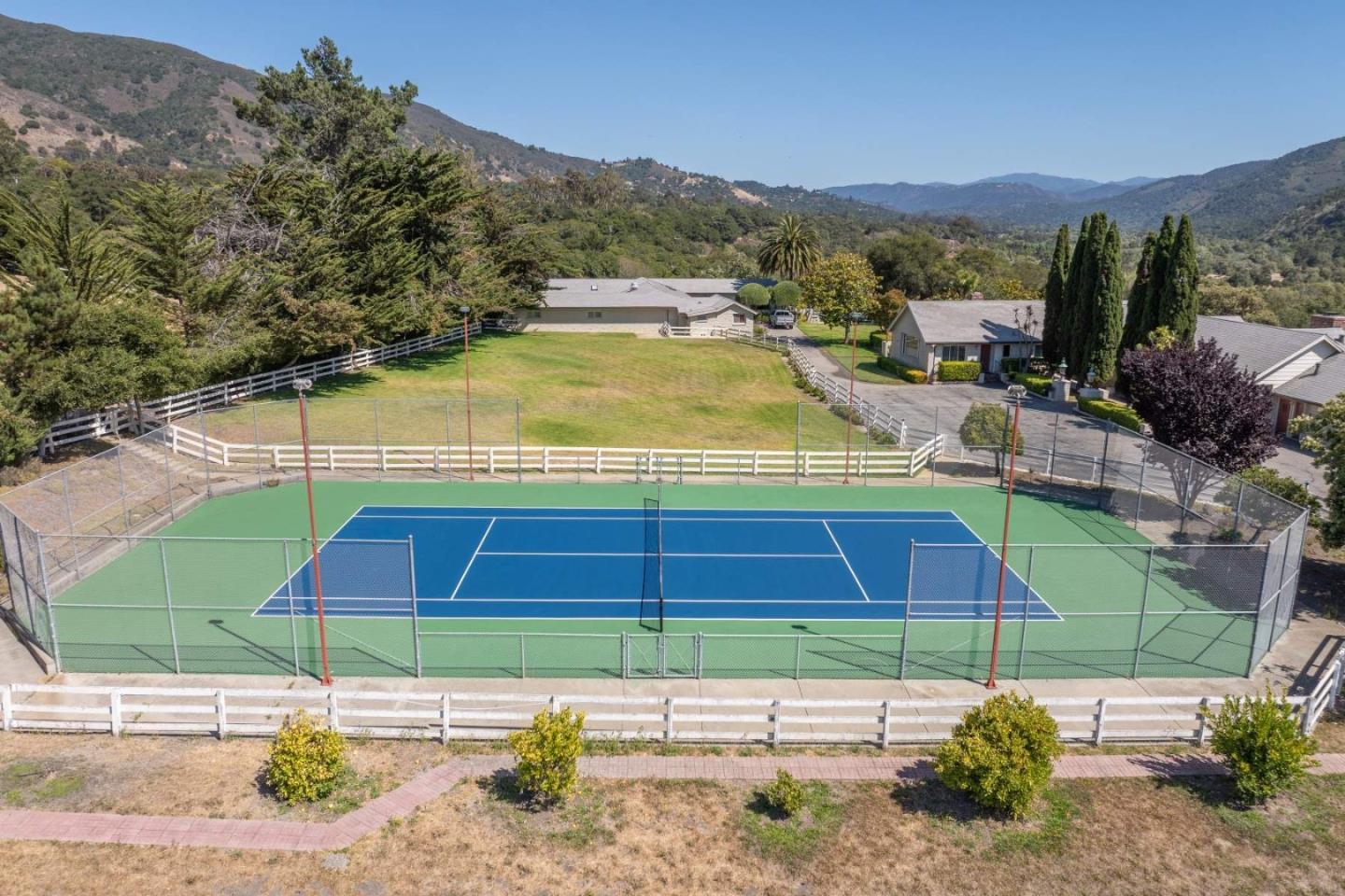 22 Rancho Fiesta Road Carmel Valley, CA 93924 - Photo 3 of 44 a view of a tennis court