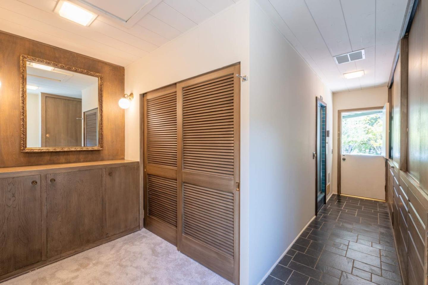 22 Rancho Fiesta Road Carmel Valley, CA 93924 - Photo 33 of 44 a view of hallway with windows
