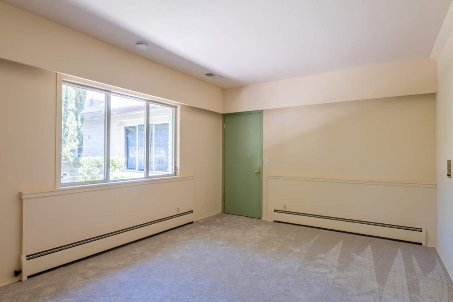 22 Rancho Fiesta Road Carmel Valley, CA 93924 - Photo 36 of 44 an empty room with windows