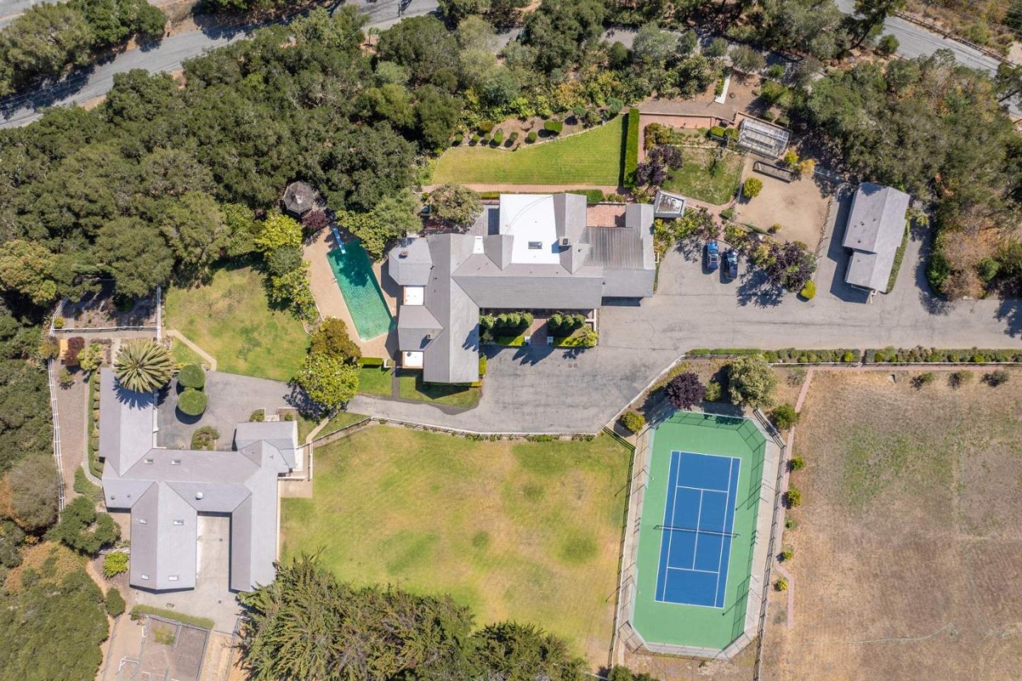 22 Rancho Fiesta Road Carmel Valley, CA 93924 - Photo 4 of 44 an aerial view of a house with a swimming pool