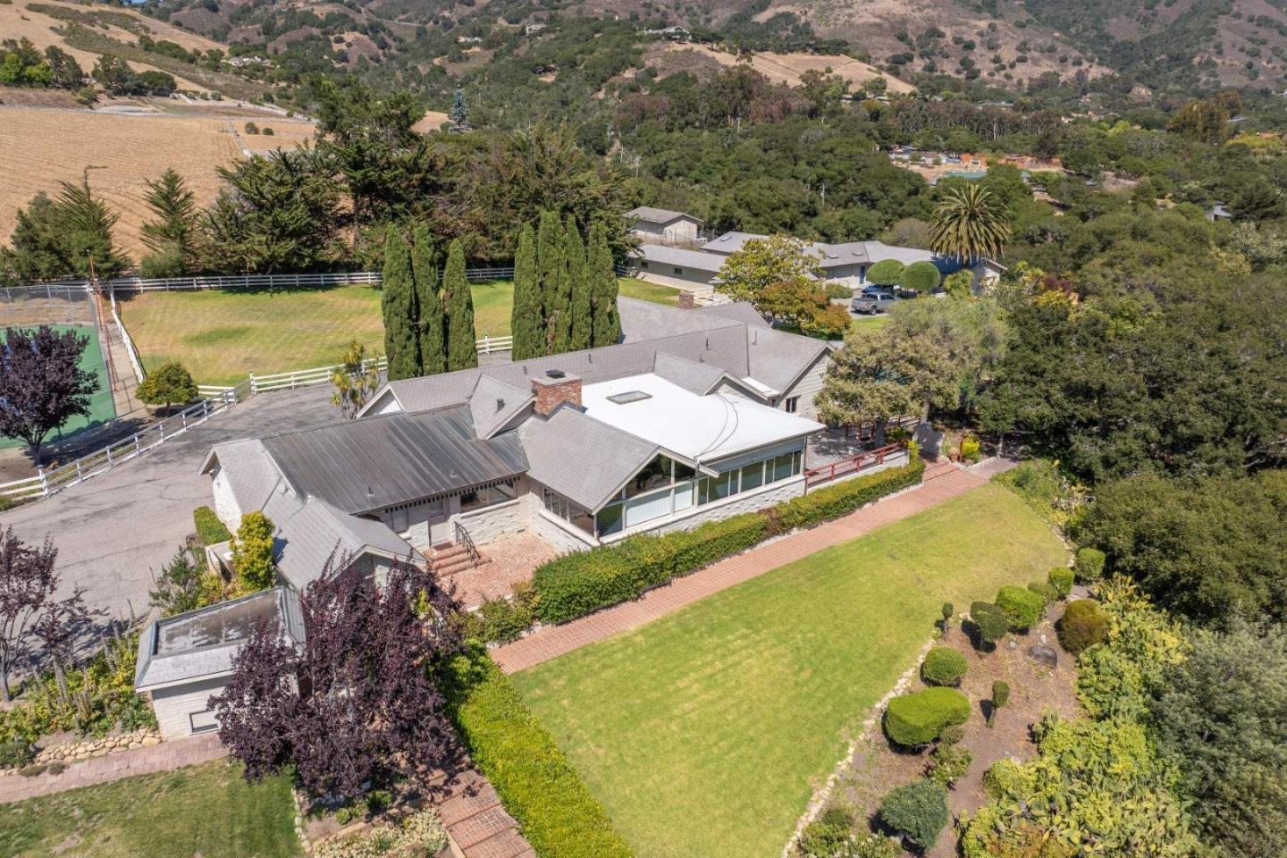 22 Rancho Fiesta Road Carmel Valley, CA 93924 - Photo 41 of 44 an aerial view of a house with a swimming pool and outdoor space