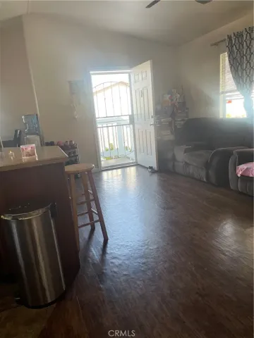 a view of livingroom with furniture and window