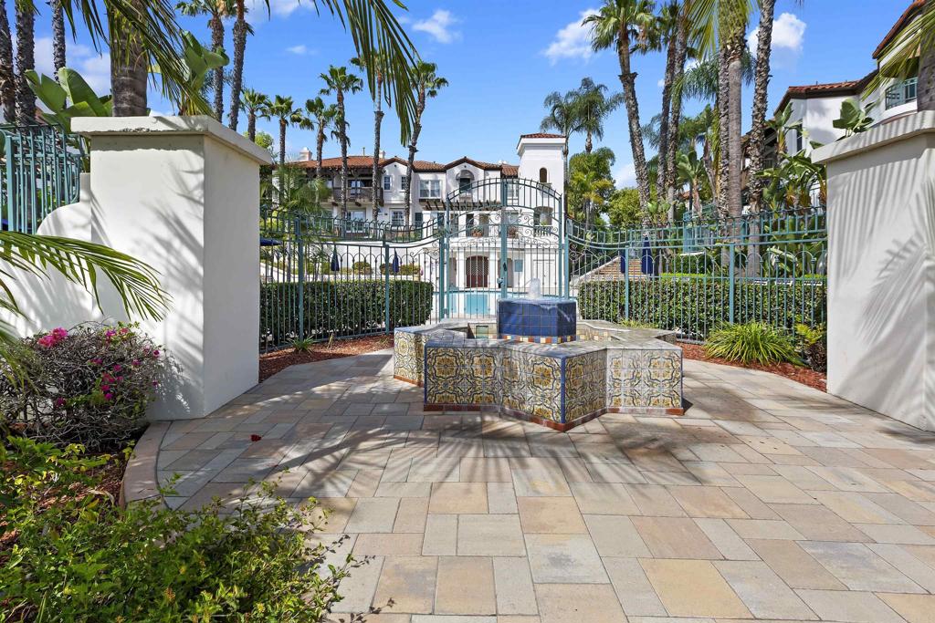 2871 Player Lane Tustin, CA 92782 - Photo 26 of 44 a view of a patio with couches and table and chairs next to yard