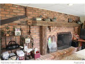 2962 Hiller Road West Bloomfield, MI 48324 - Photo 32 of 48 Walkout Lower Level with Brick Fireplace