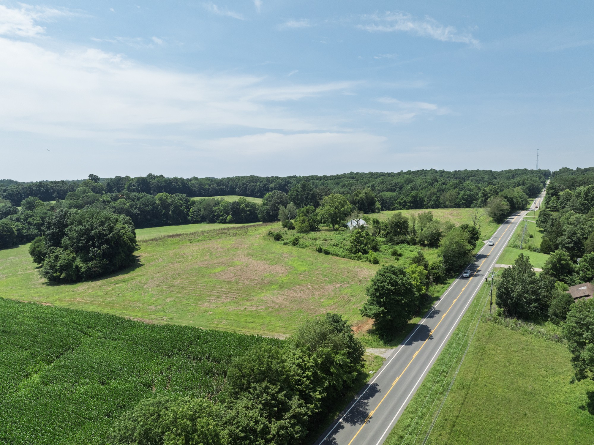 4776 State Highway 48 Cumberland Furnace, TN 37051 - Photo 7 of 12 a view of a lake with a yard