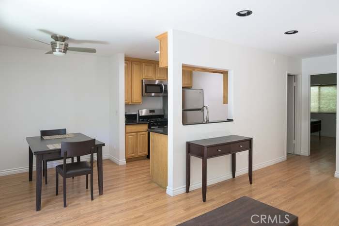 4812 Hollow Corner Road, Unit 151 Culver City, CA 90230 - Photo 4 of 14 a room with furniture and wooden floor
