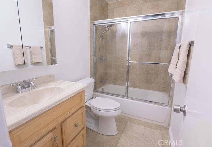 4812 Hollow Corner Road, Unit 151 Culver City, CA 90230 - Photo 5 of 14 a bathroom with a sink toilet and shower
