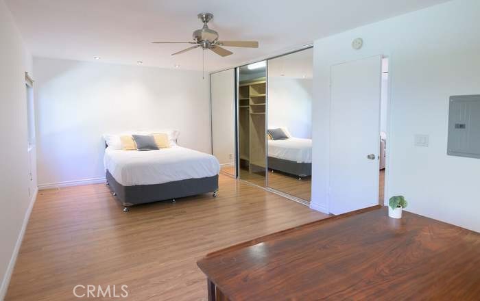 4812 Hollow Corner Road, Unit 151 Culver City, CA 90230 - Photo 6 of 14 a spacious bedroom with a bed and a couch