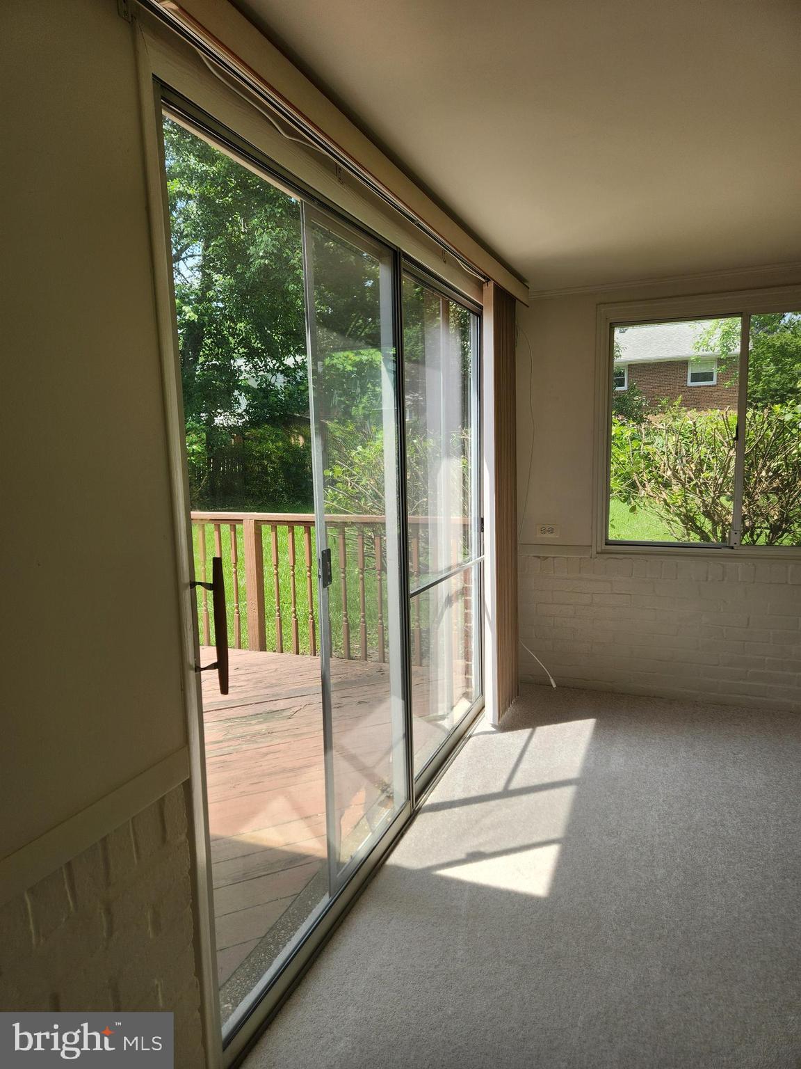 7510 Hogarth Street Springfield, VA 22151 - Photo 30 of 47 Sunroom with sliding doors out to deck