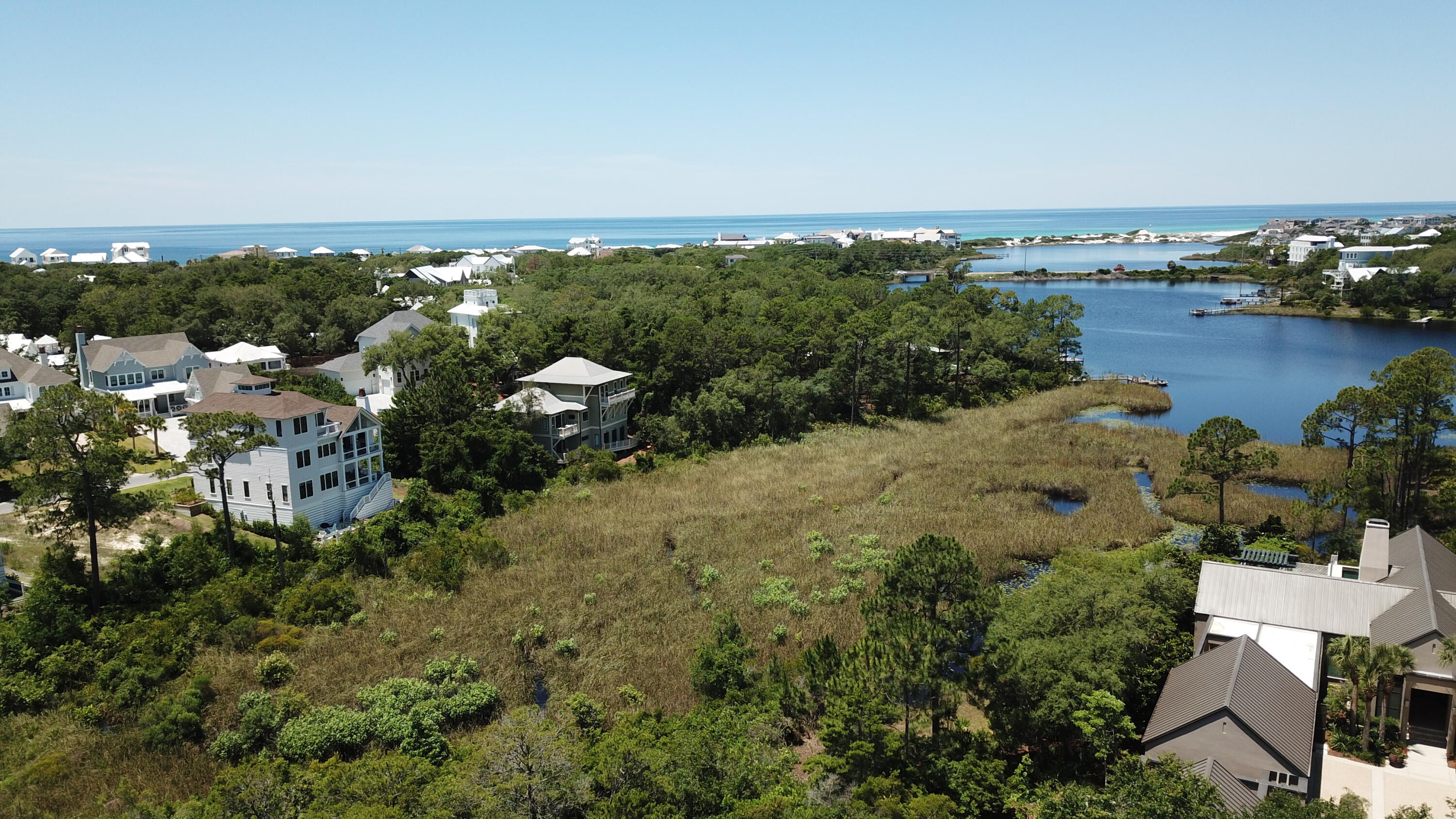 Lot 2 Cove Creek Ln Inlet Beach Inlet Beach, FL 32461 - Photo 13 of 23 an aerial view of a city with ocean view