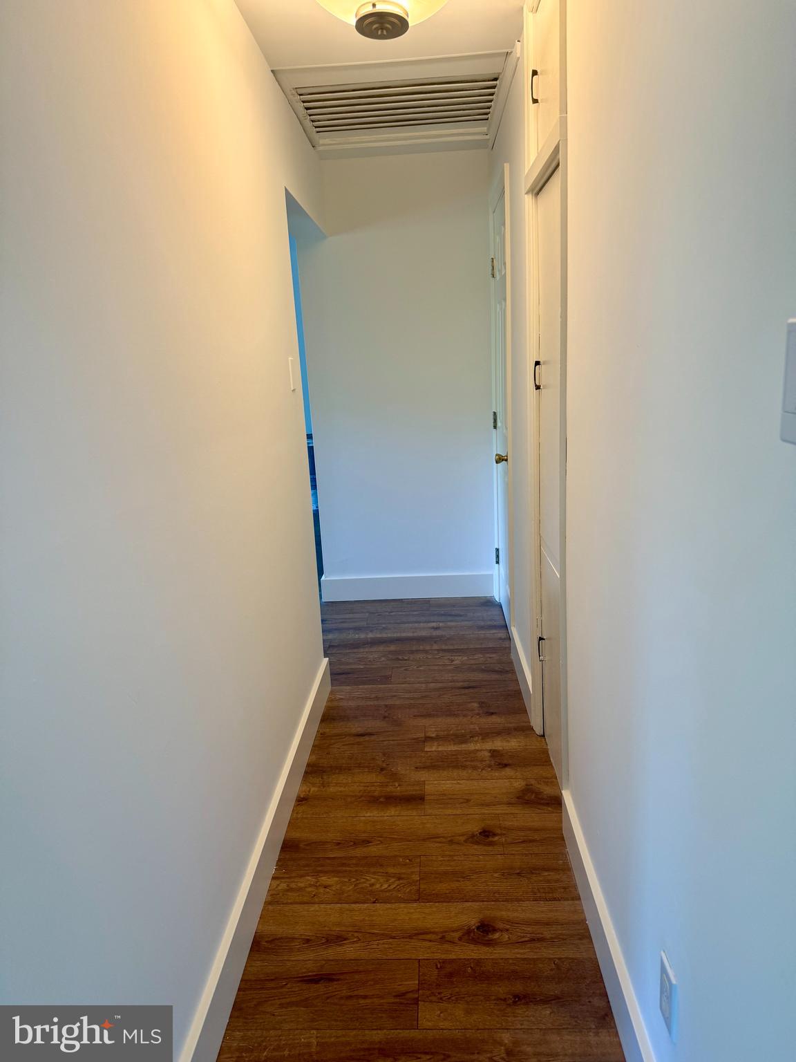 5 Copes Lane Media, PA 19063 - Photo 9 of 18 a view of a hallway with wooden floor