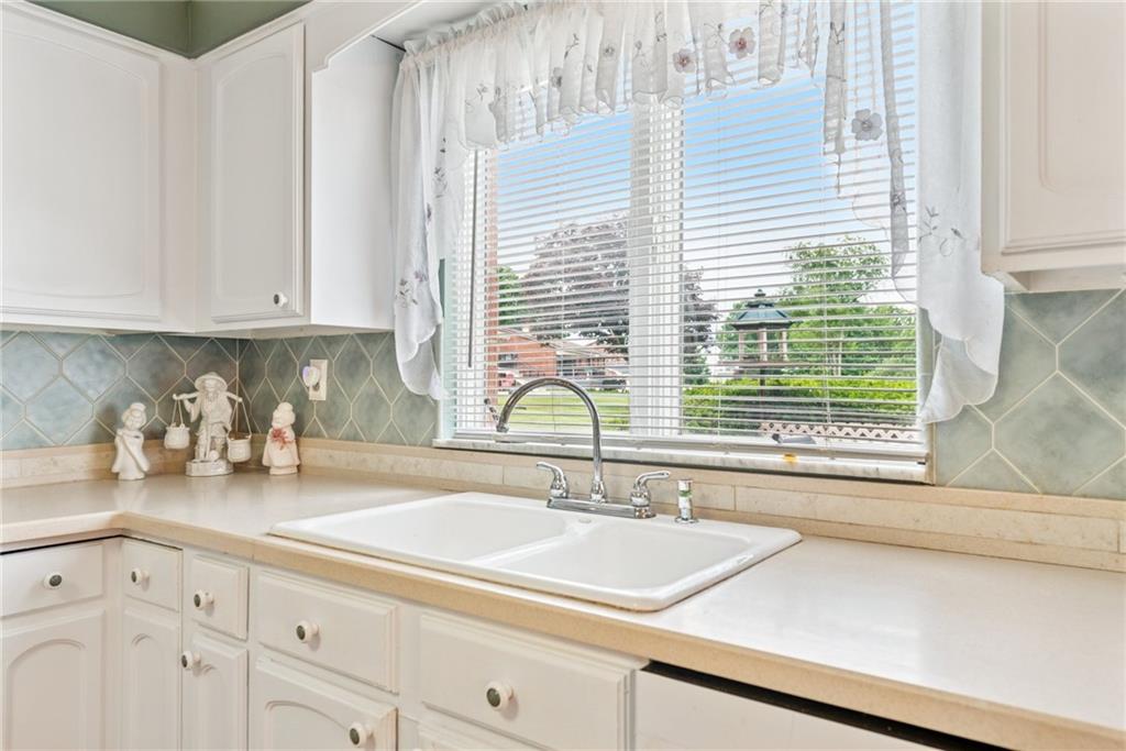 145 Herbst Road Coraopolis, PA 15108 - Photo 11 of 35 a kitchen with sink and window