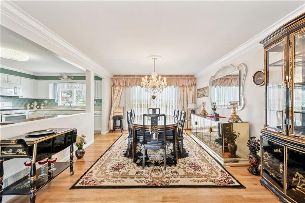 145 Herbst Road Coraopolis, PA 15108 - Photo 12 of 35 a living room with furniture a rug and a large window