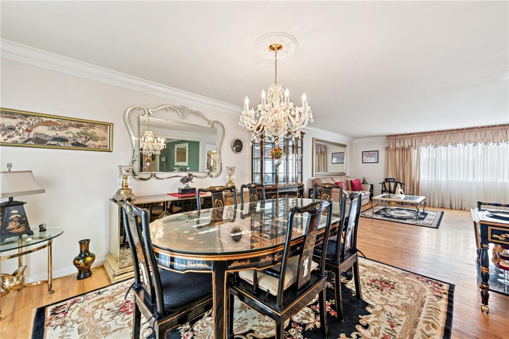 145 Herbst Road Coraopolis, PA 15108 - Photo 14 of 35 a view of a dining room with furniture and chandelier