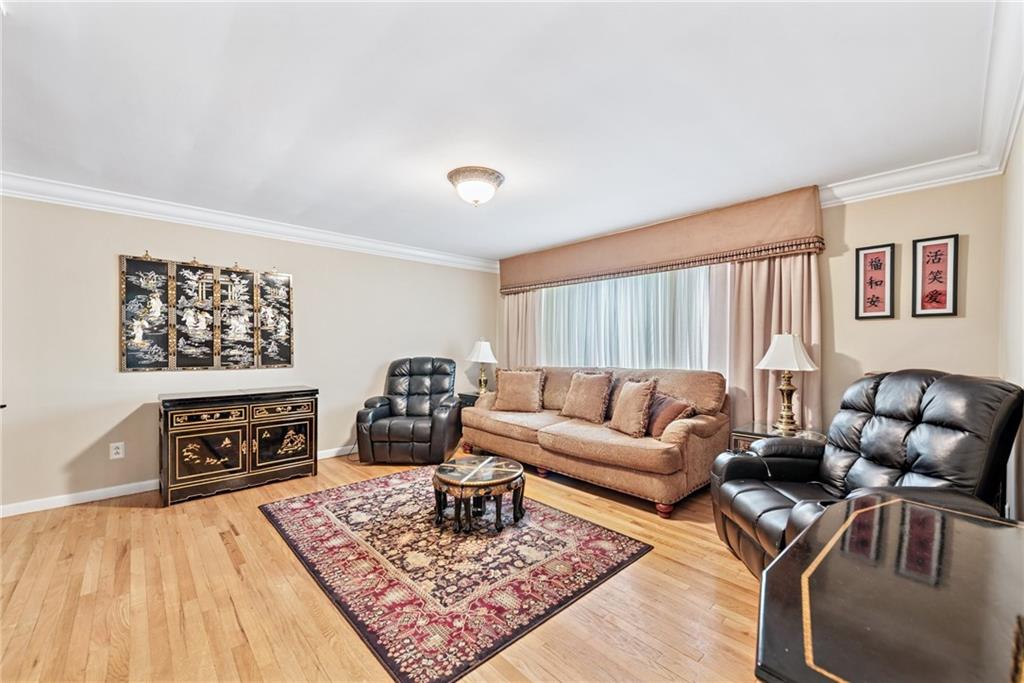 145 Herbst Road Coraopolis, PA 15108 - Photo 15 of 35 a living room with furniture and a wooden floor