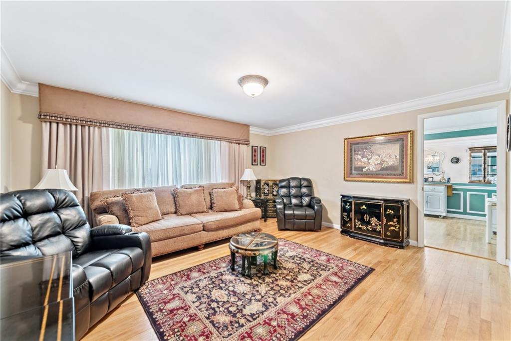 145 Herbst Road Coraopolis, PA 15108 - Photo 17 of 35 a living room with furniture and a fireplace