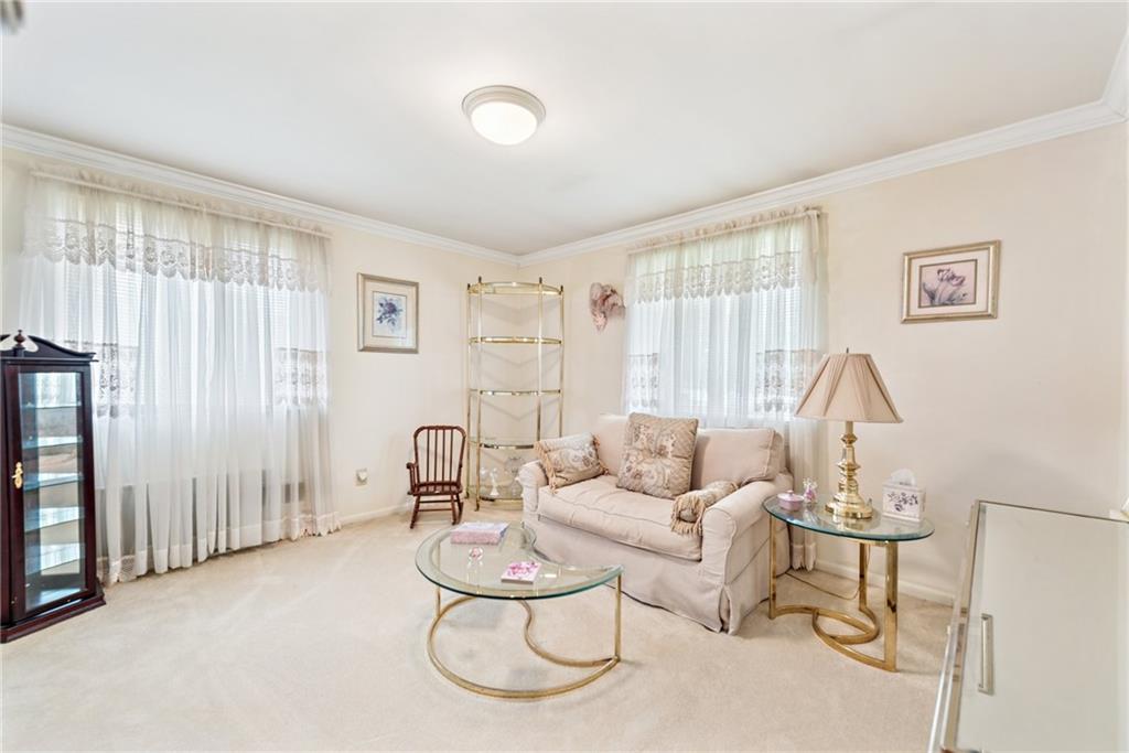 145 Herbst Road Coraopolis, PA 15108 - Photo 21 of 35 a living room with furniture and a large window