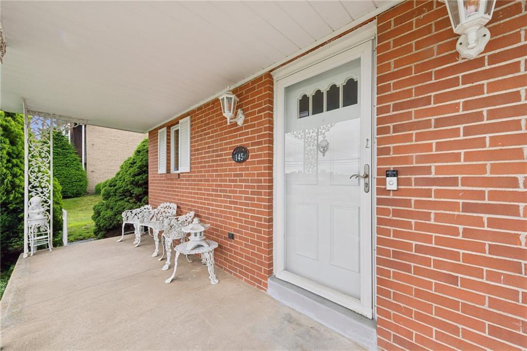 145 Herbst Road Coraopolis, PA 15108 - Photo 34 of 35 a view of a patio with a table and chairs