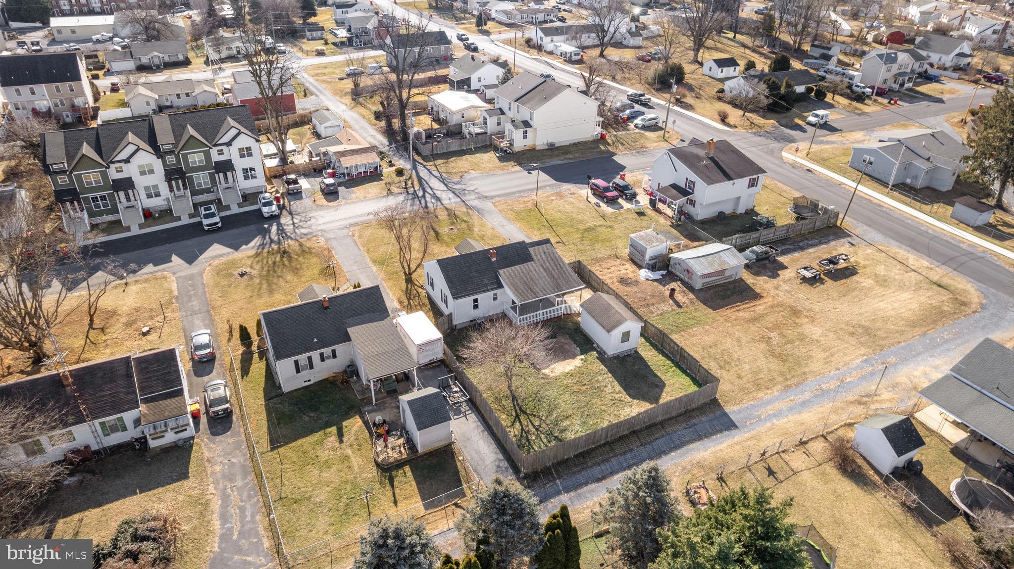 405 East 7th Avenue Ranson, WV 25438 - Photo 25 of 29 an aerial view of residential houses with outdoor space