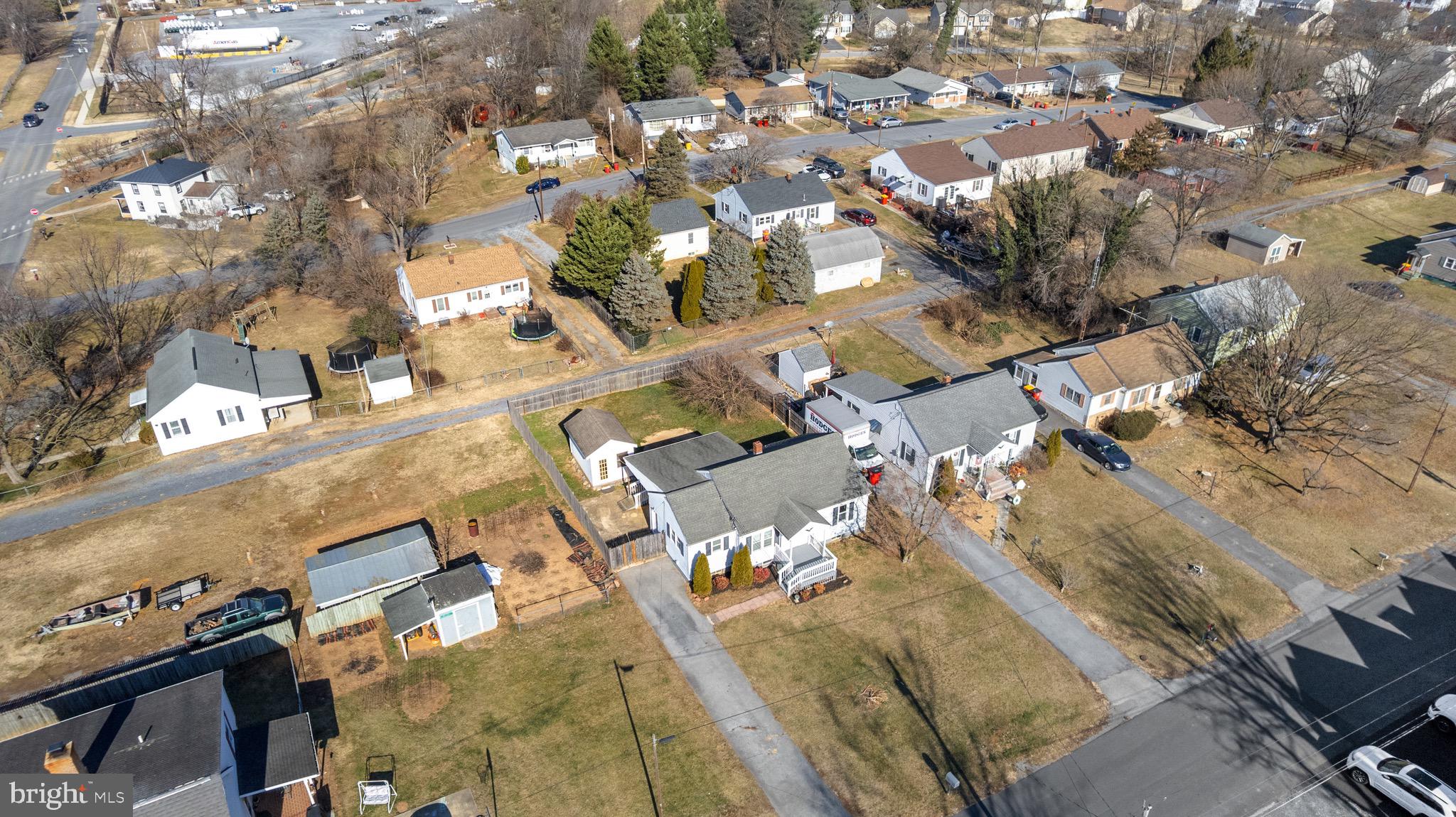 405 East 7th Avenue Ranson, WV 25438 - Photo 28 of 29 an aerial view of residential houses with outdoor space