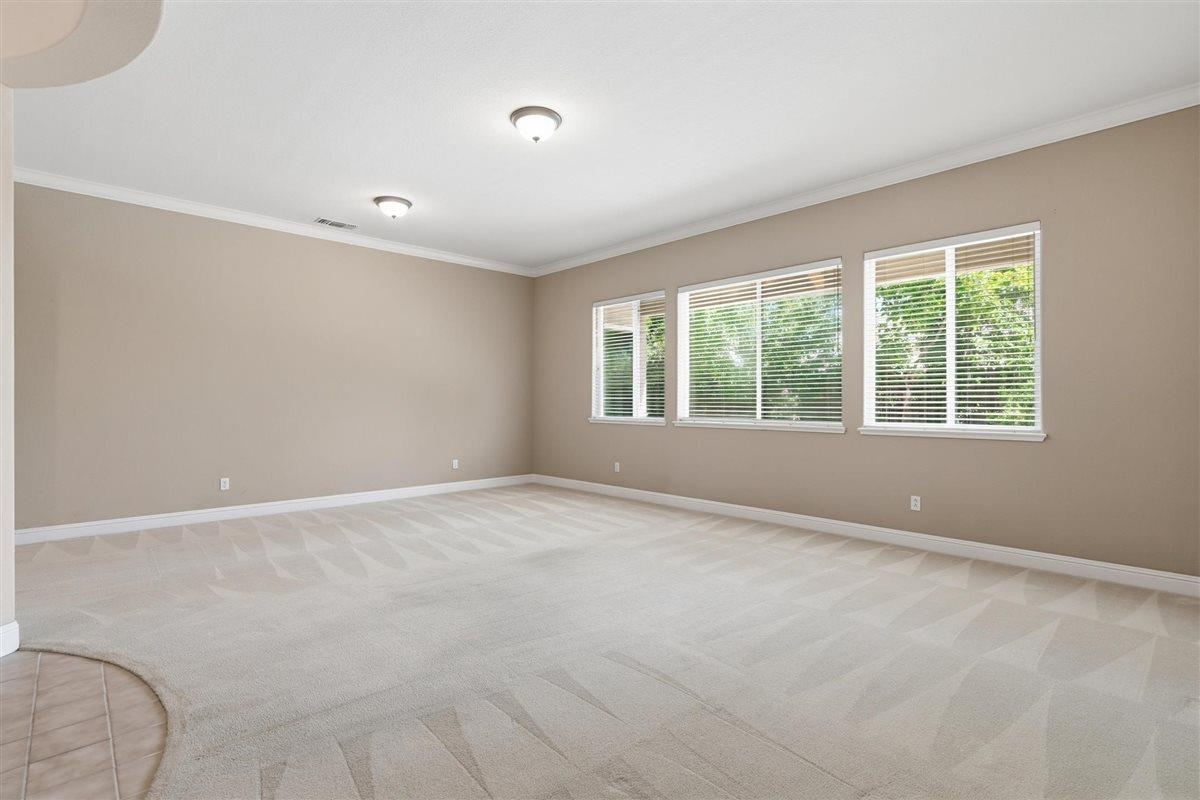 4129 Poppleton Way Carmichael, CA 95608 - Photo 9 of 48 an empty room with windows