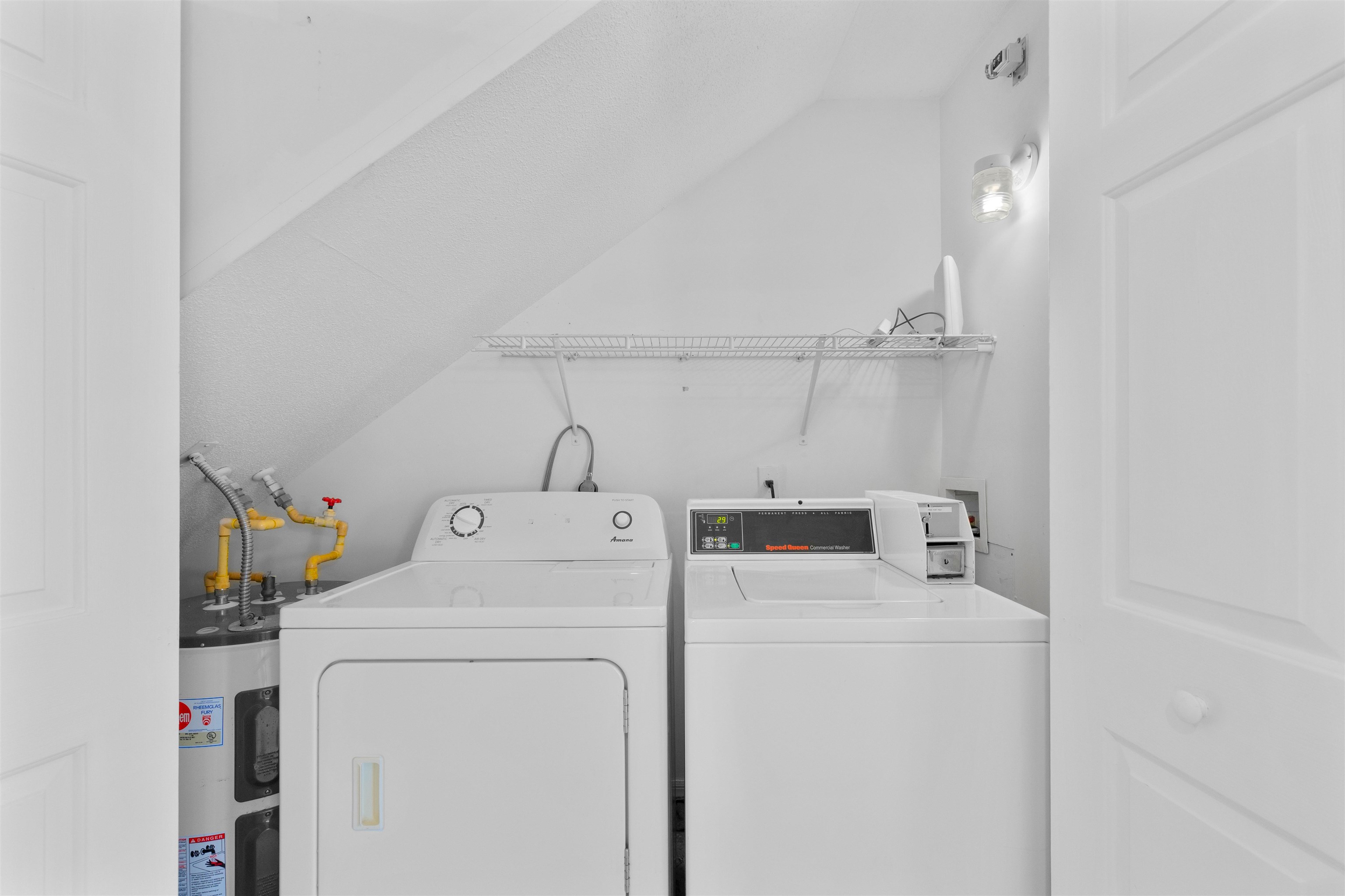 109 B Street, Unit B St. Augustine Beach, FL 32080 - Photo 11 of 30 a utility room with dryer and washer