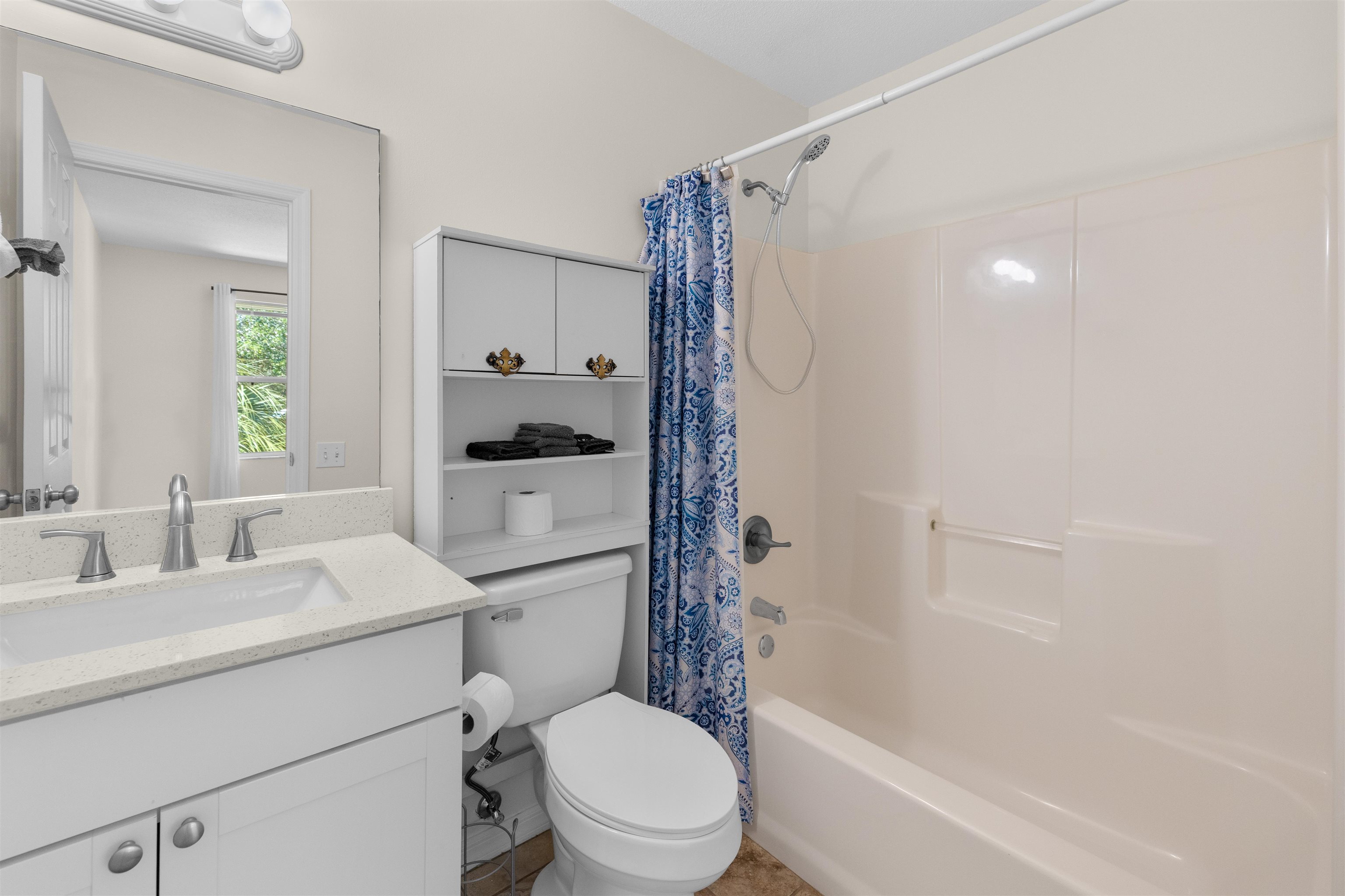 109 B Street, Unit B St. Augustine Beach, FL 32080 - Photo 22 of 30 a bathroom with a sink toilet and shower