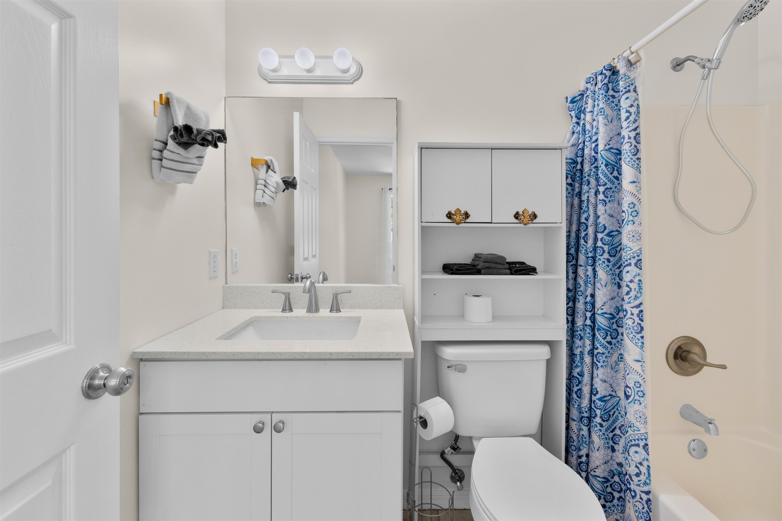 109 B Street, Unit B St. Augustine Beach, FL 32080 - Photo 23 of 30 a bathroom with a sink a toilet and shower