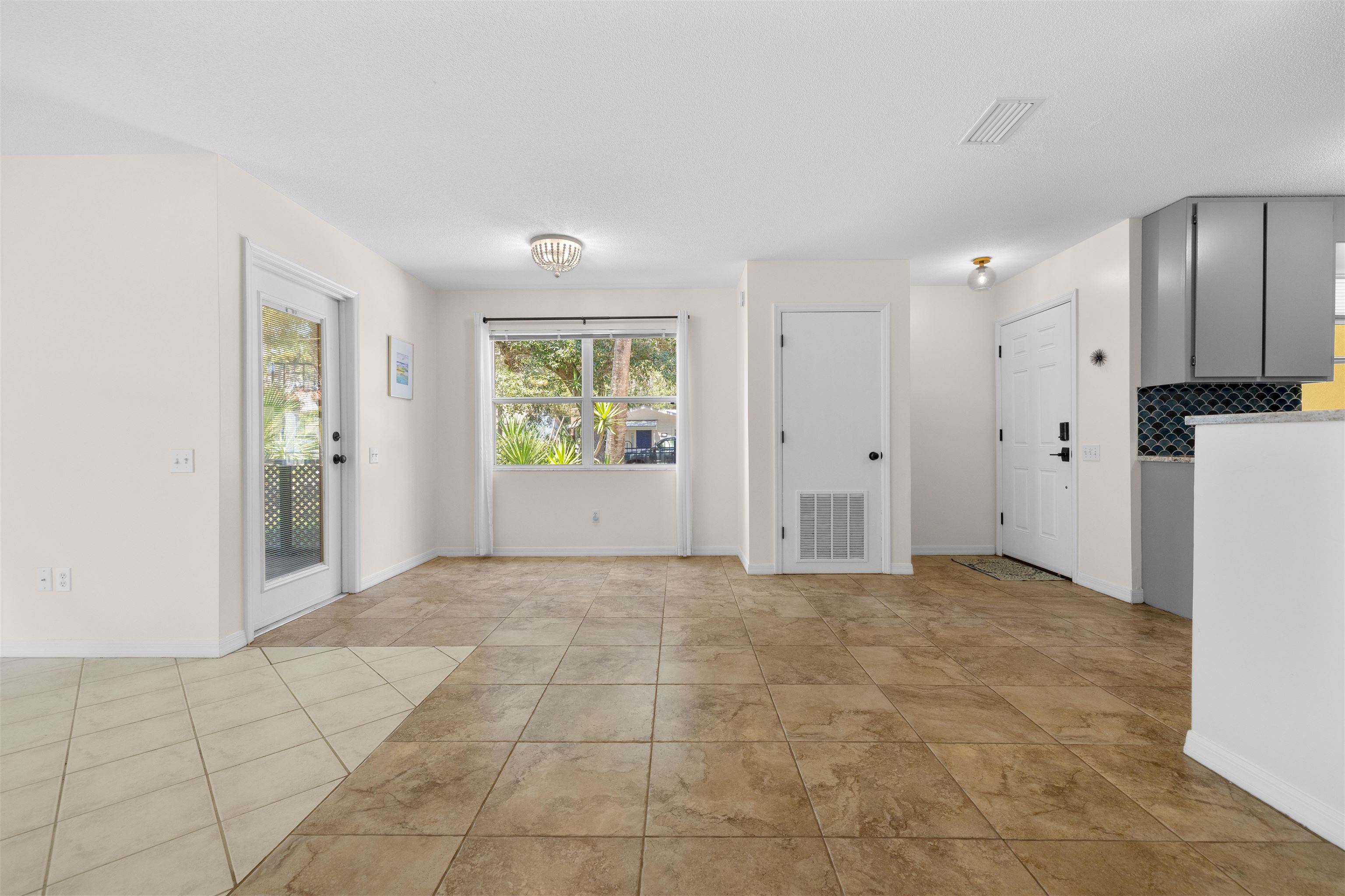 109 B Street, Unit B St. Augustine Beach, FL 32080 - Photo 7 of 30 a view of an empty room with a window