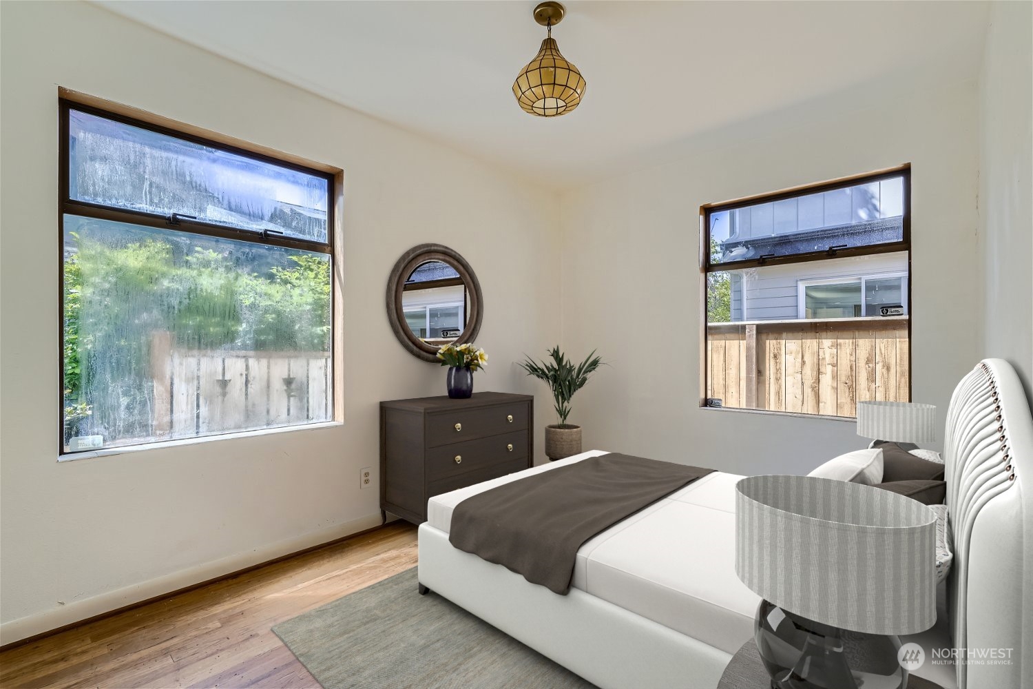 730 North 67th Street Seattle, WA 98103 - Photo 11 of 37 a bedroom with a bed and a window