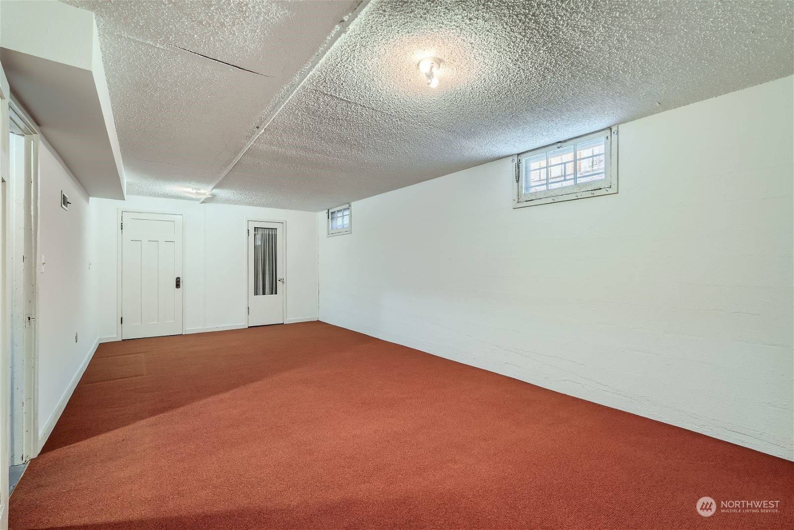 730 North 67th Street Seattle, WA 98103 - Photo 14 of 37 an empty room with windows