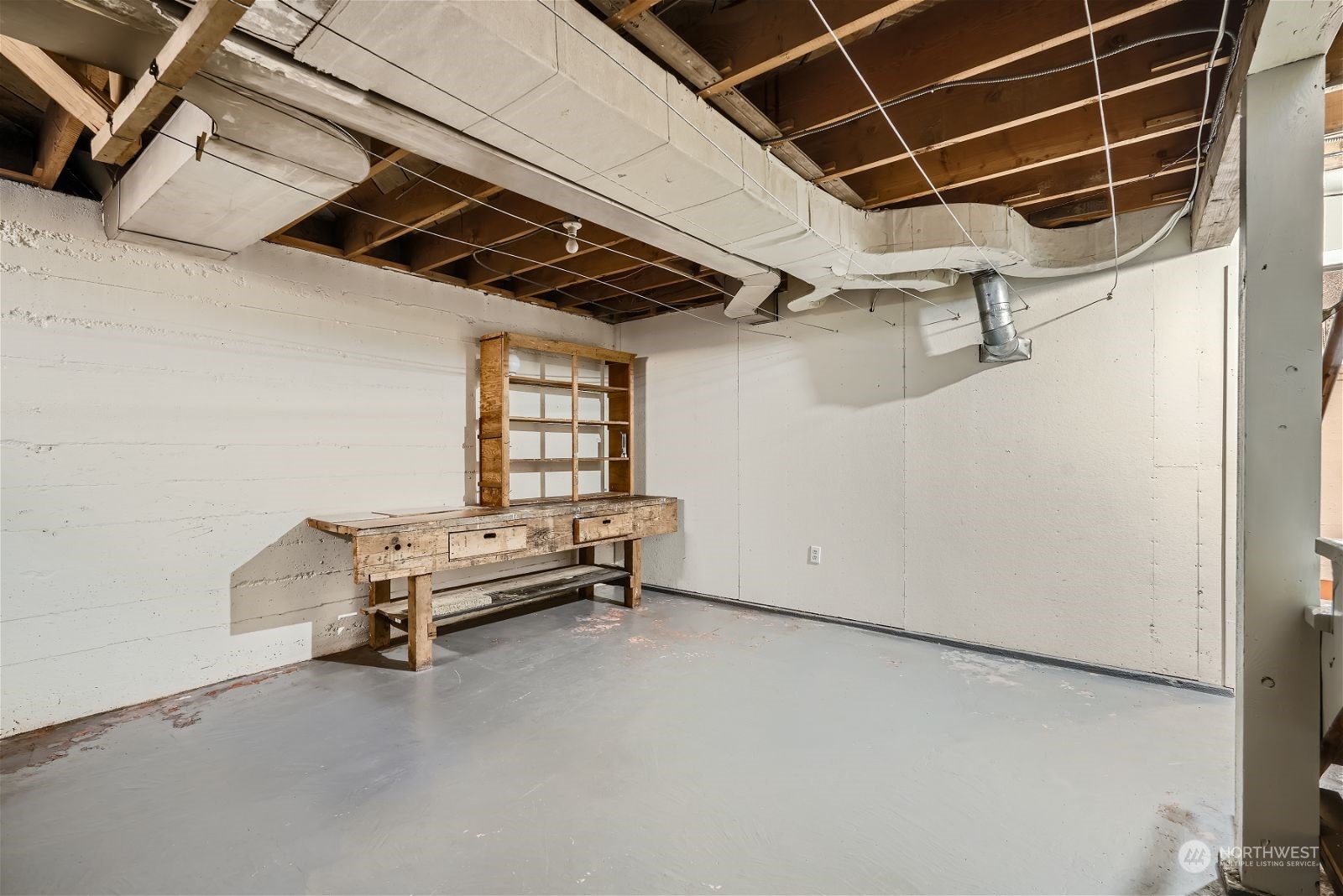 730 North 67th Street Seattle, WA 98103 - Photo 19 of 37 a view of an empty room with windows