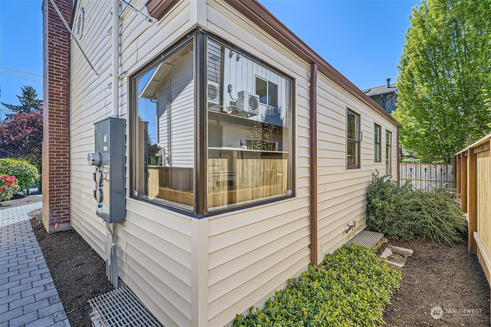 730 North 67th Street Seattle, WA 98103 - Photo 21 of 37 a view of a house with a yard