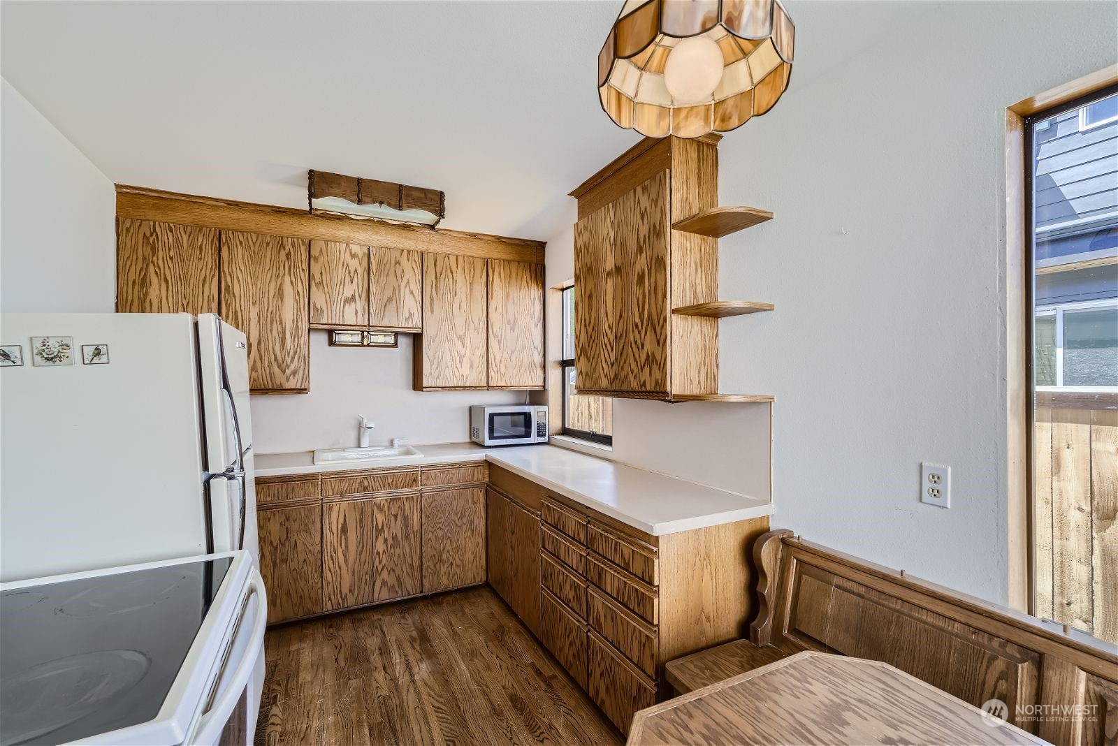 730 North 67th Street Seattle, WA 98103 - Photo 31 of 37 a kitchen with a sink stainless steel appliances and cabinets