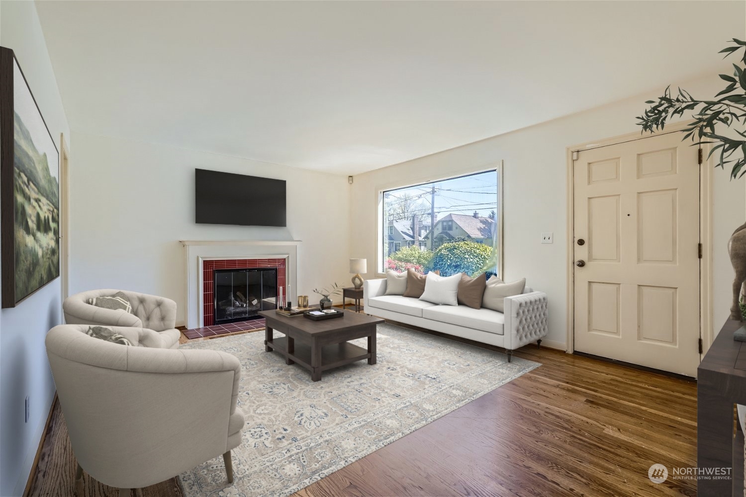 730 North 67th Street Seattle, WA 98103 - Photo 8 of 37 a living room with furniture a fireplace and a flat screen tv