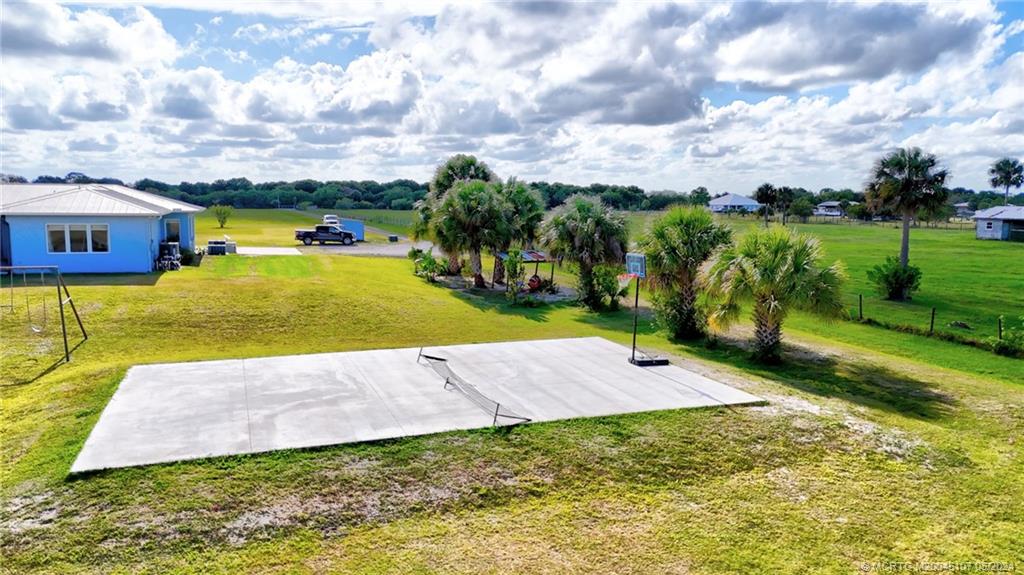 2366 South Brocksmith Road Fort Pierce, FL 34945 - Photo 42 of 49 a view of a basketball court