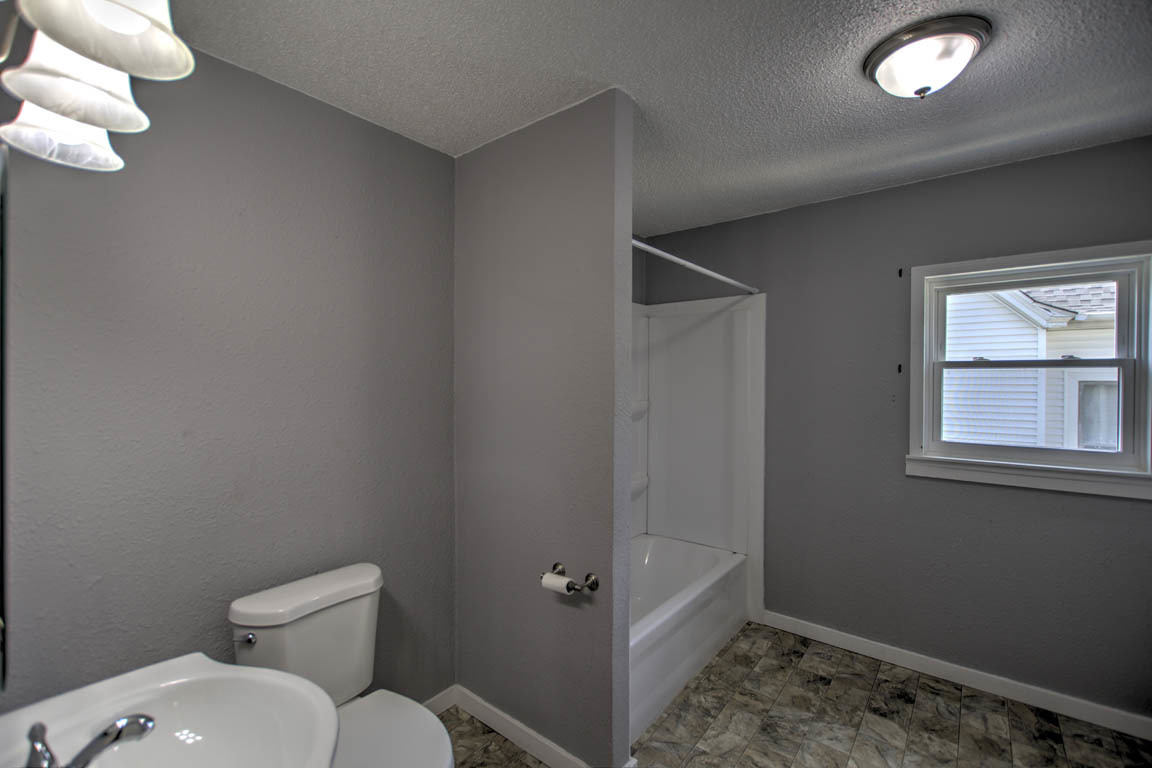 204 West South Street Clinton, IL 61727 - Photo 16 of 23 a bathroom with a toilet