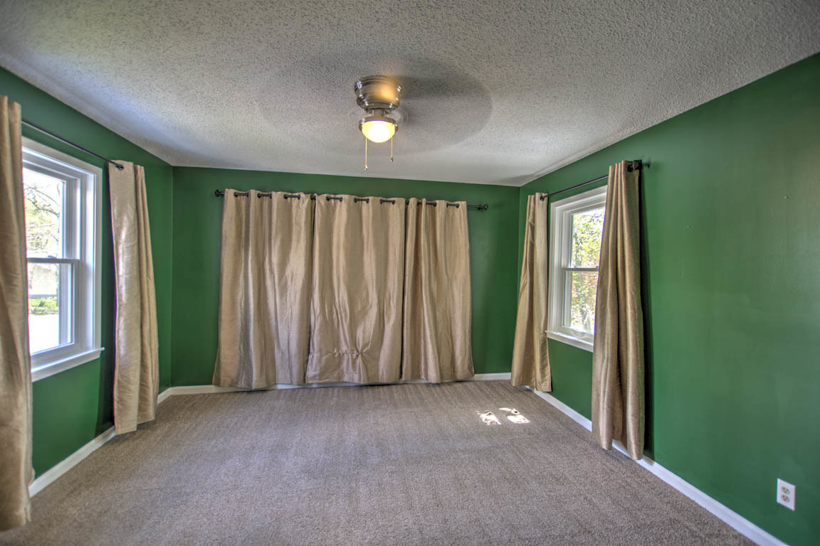 204 West South Street Clinton, IL 61727 - Photo 17 of 23 an empty room with yard and windows