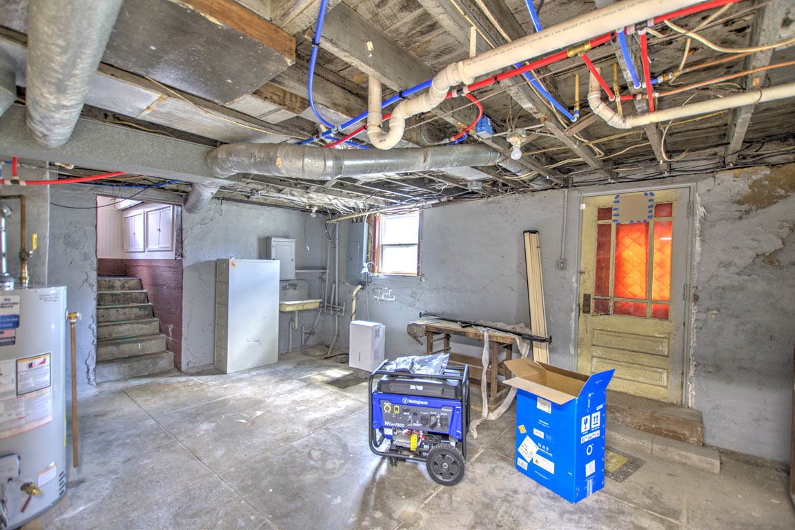 204 West South Street Clinton, IL 61727 - Photo 19 of 23 a view of a storage room with a refrigerator
