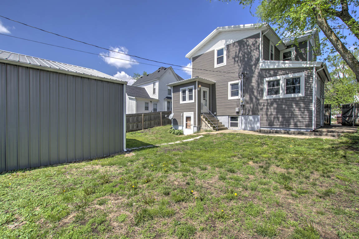 204 West South Street Clinton, IL 61727 - Photo 22 of 23 a front view of a house with a yard