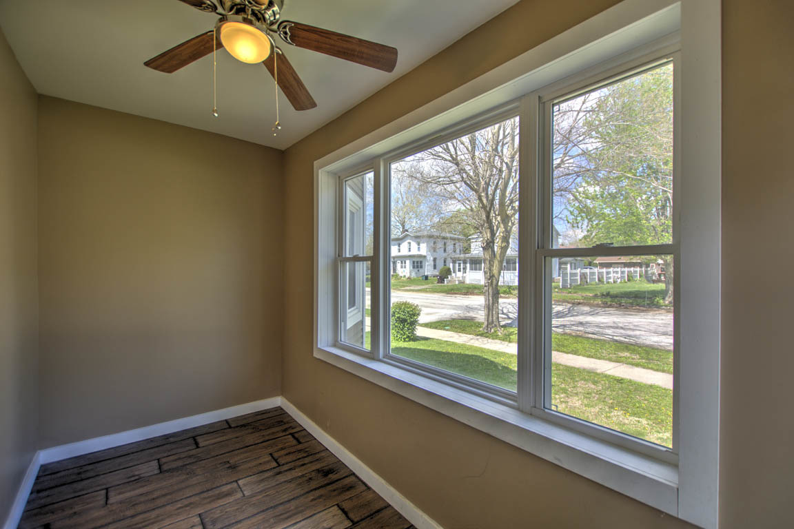 204 West South Street Clinton, IL 61727 - Photo 3 of 23 a view of an empty room with a window
