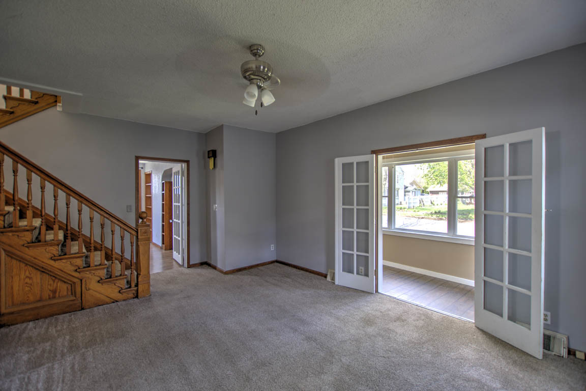 204 West South Street Clinton, IL 61727 - Photo 4 of 23 a view of an empty room with a window