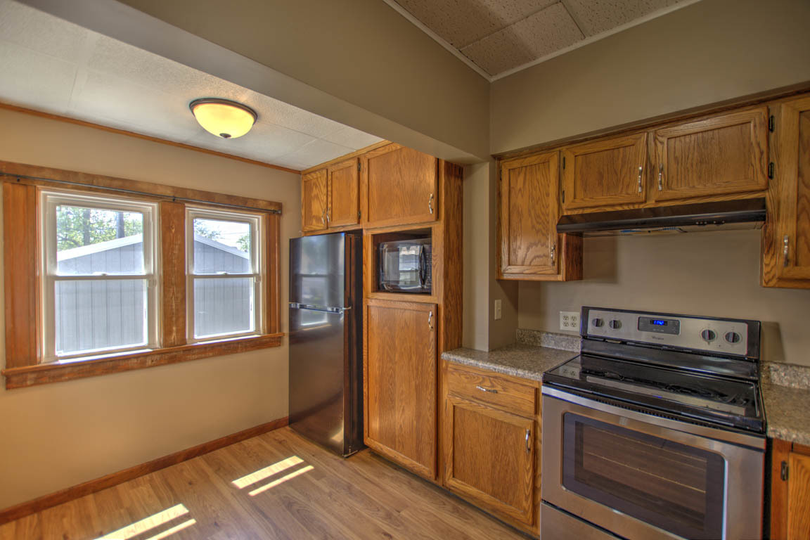 204 West South Street Clinton, IL 61727 - Photo 8 of 23 a kitchen with a refrigerator and window